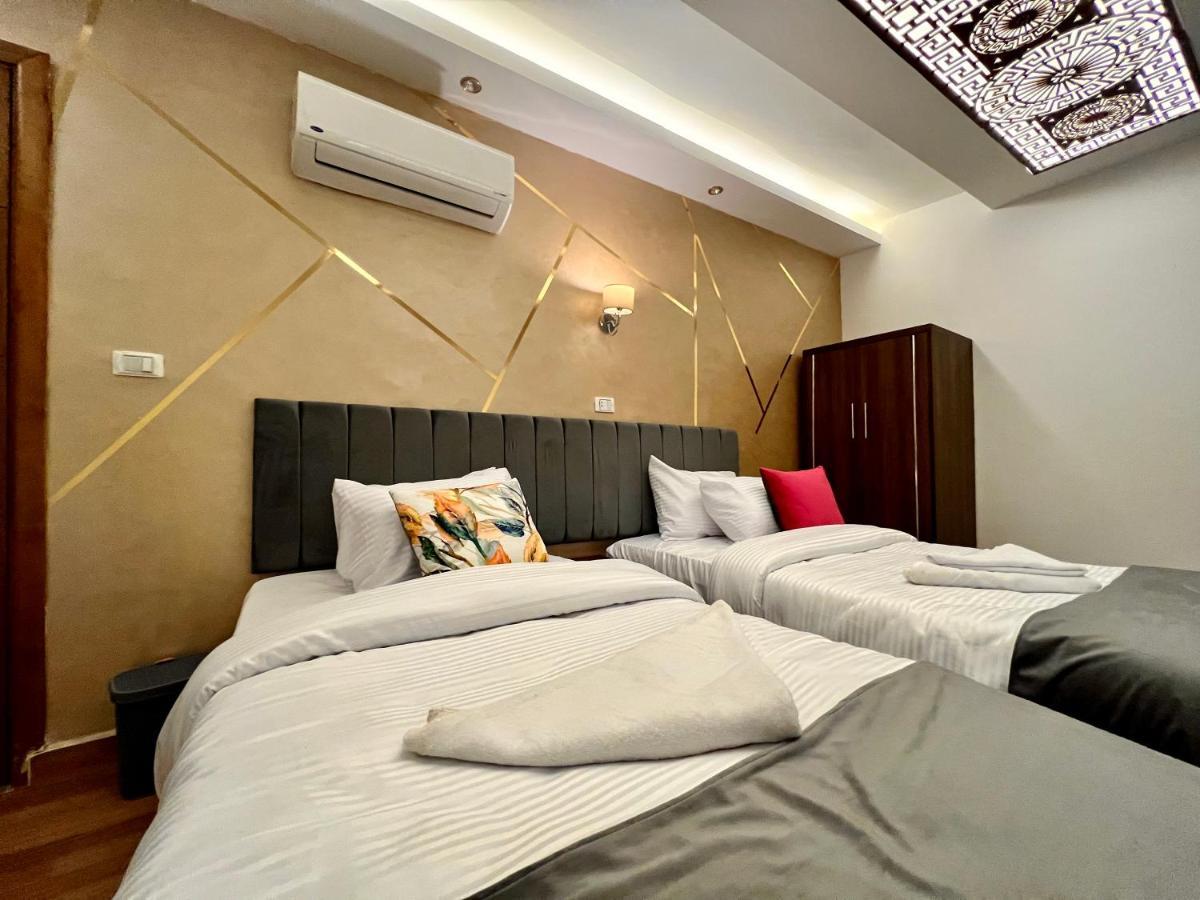 Grand Pyramids Inn Kafrat al Jabal Екстер'єр фото
