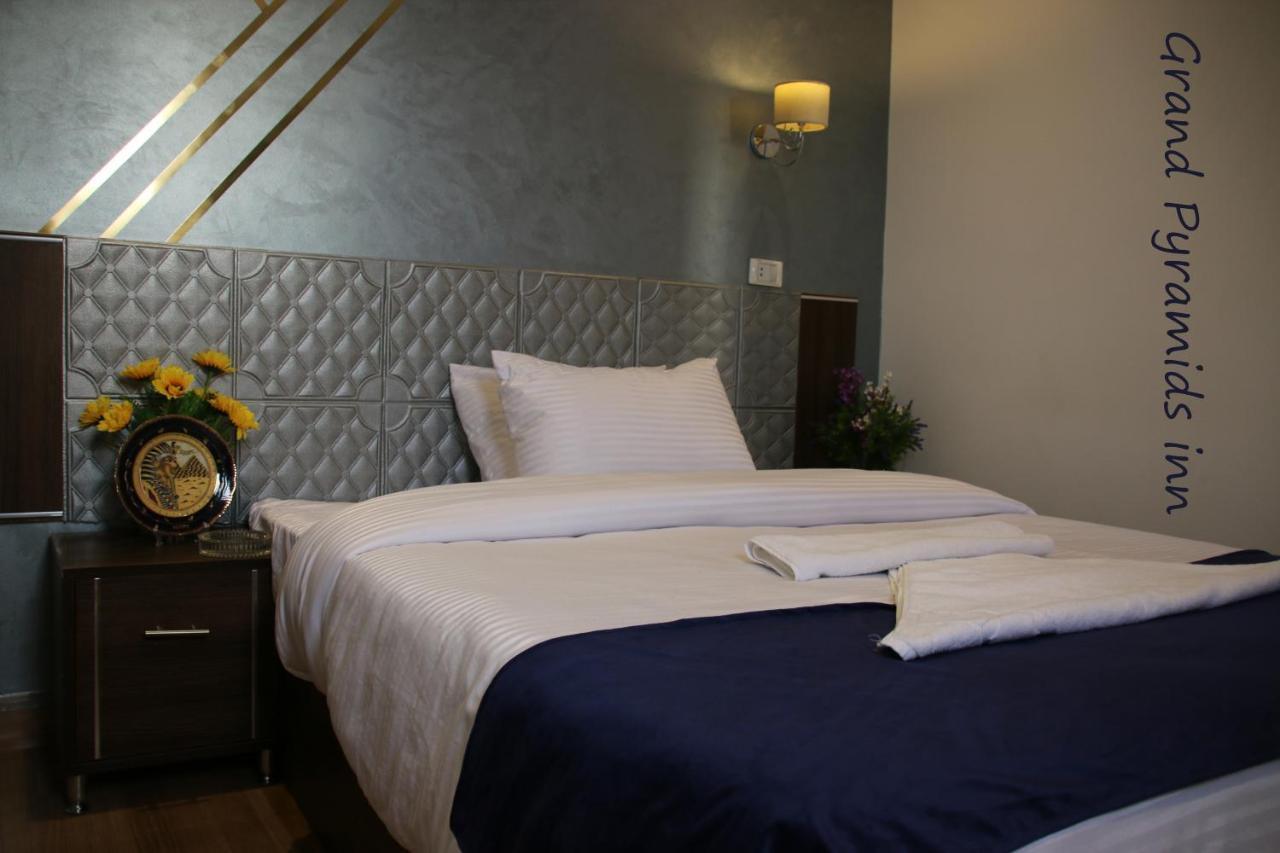 Grand Pyramids Inn Kafrat al Jabal Екстер'єр фото